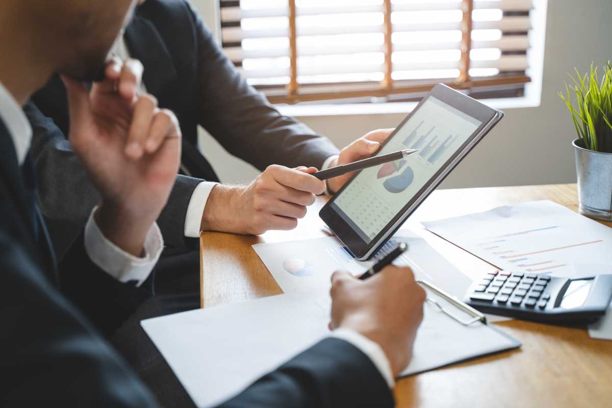 Financial advisor showing plan for growth