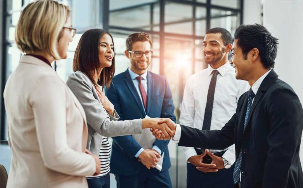 Businesspeople shaking hands.